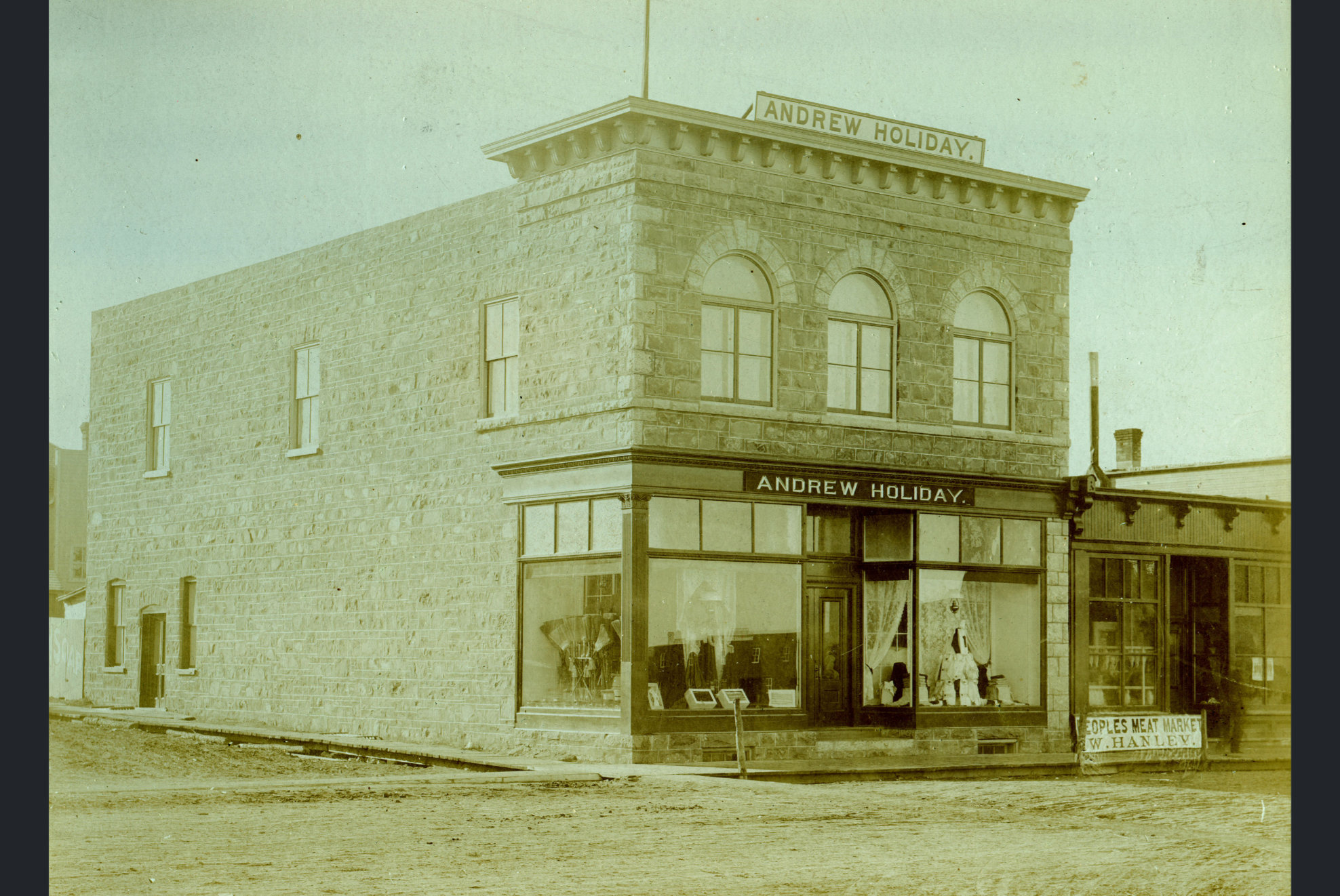 [Scanned photo of the Andrew Holiday store]