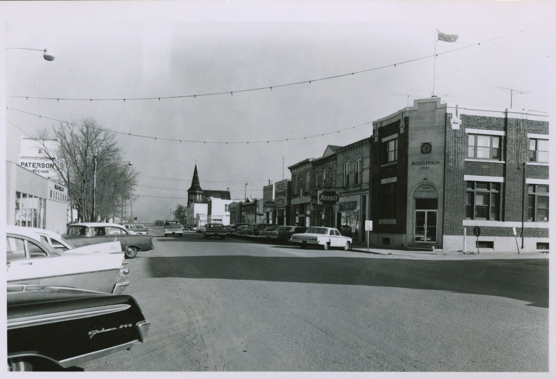 [Scanned photo of South Railway looking west through the Cook Street intersection]