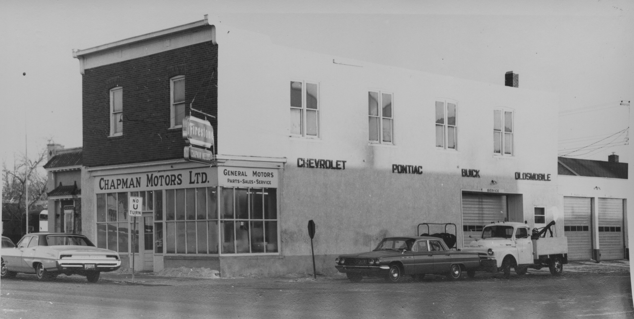 [Scanned photo of the Chapman Motors building on the Southeast corner of the South Railway and Broadway intersection]