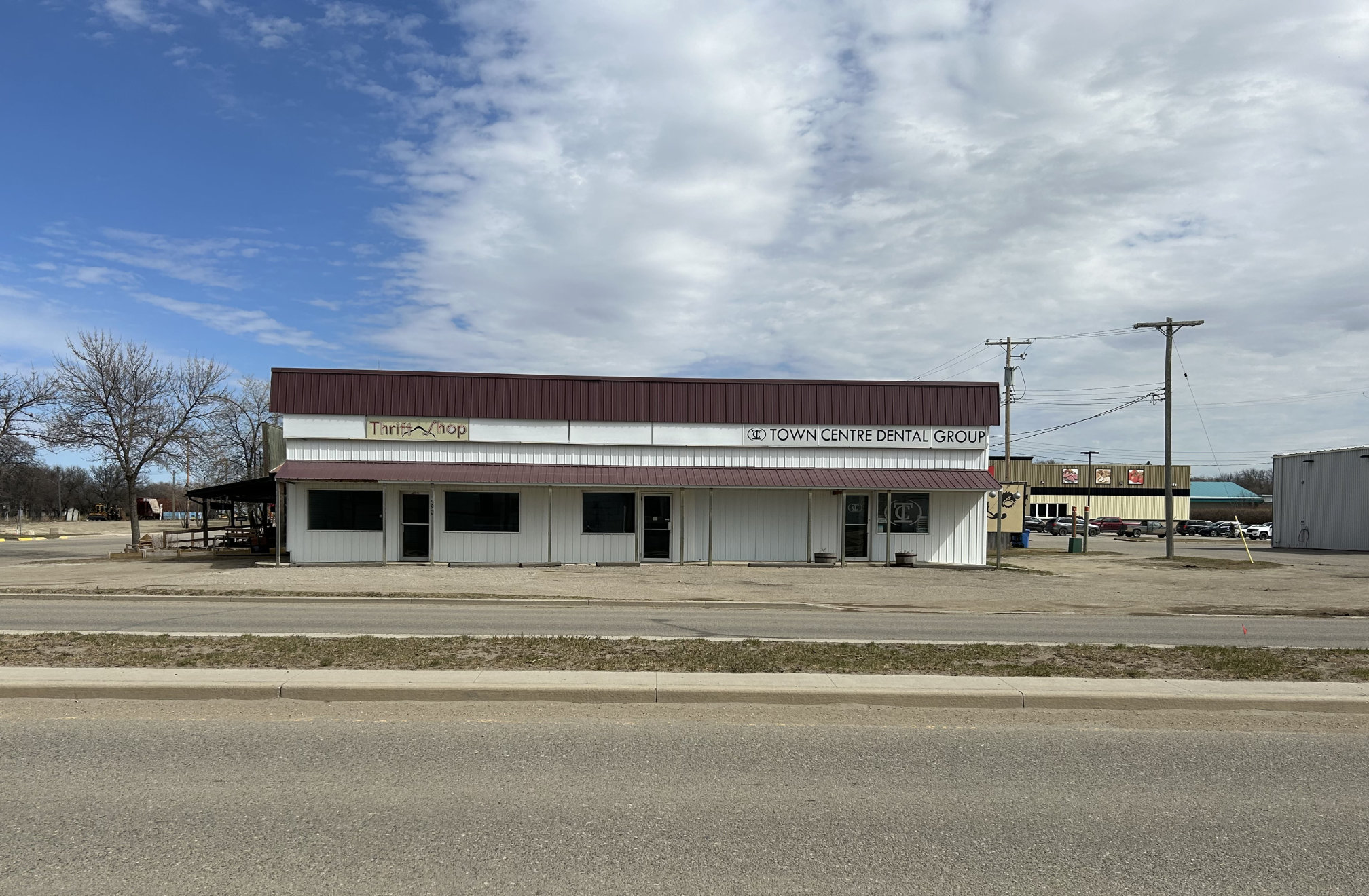 [2024 photo of Town Centre Dental Group building at the intersection of Mill Road and South Railway]